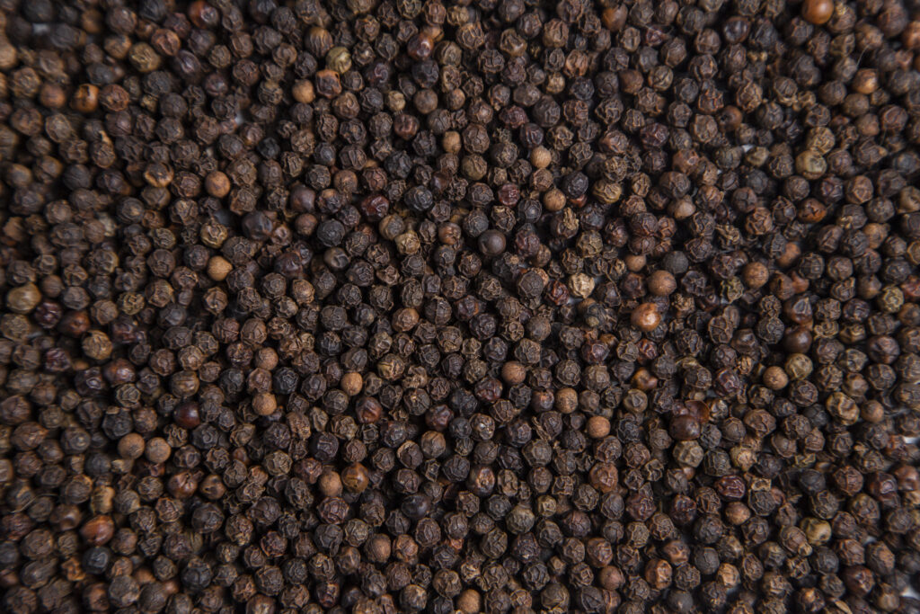 black milled pepper corns as a background